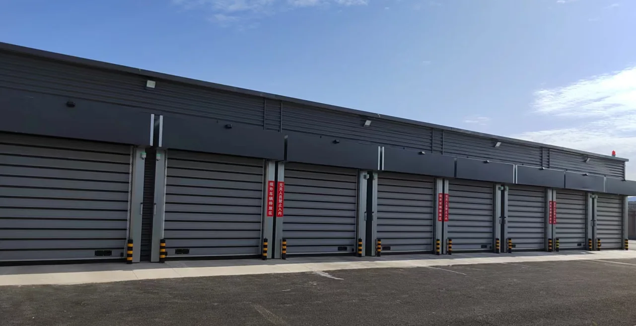 Multiple LEFAST high-speed spiral doors installed at an industrial facility